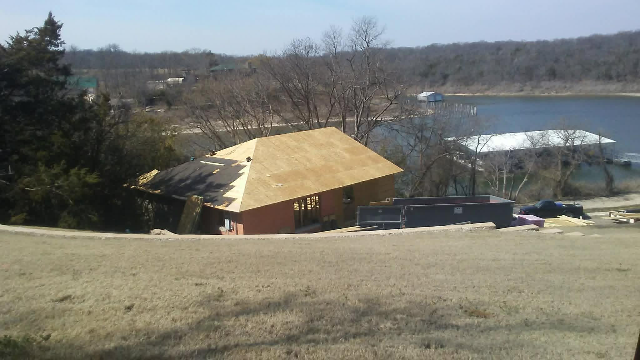 Aerial view of new construction project by the lake
